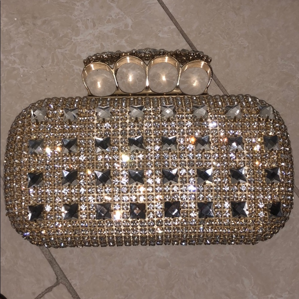 Brand new shiny gold clutch